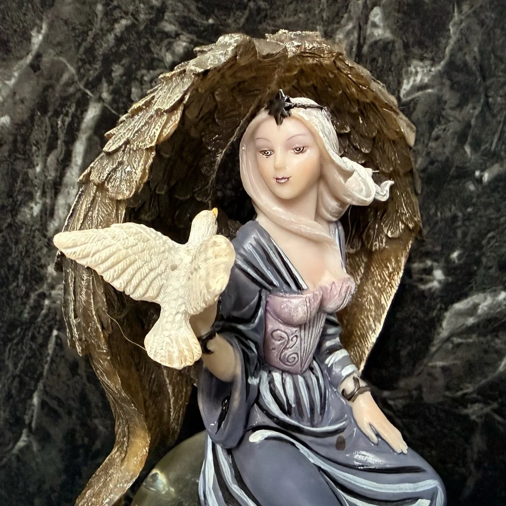 Angel/Fairy with Bird Figurine on Glass Ball
